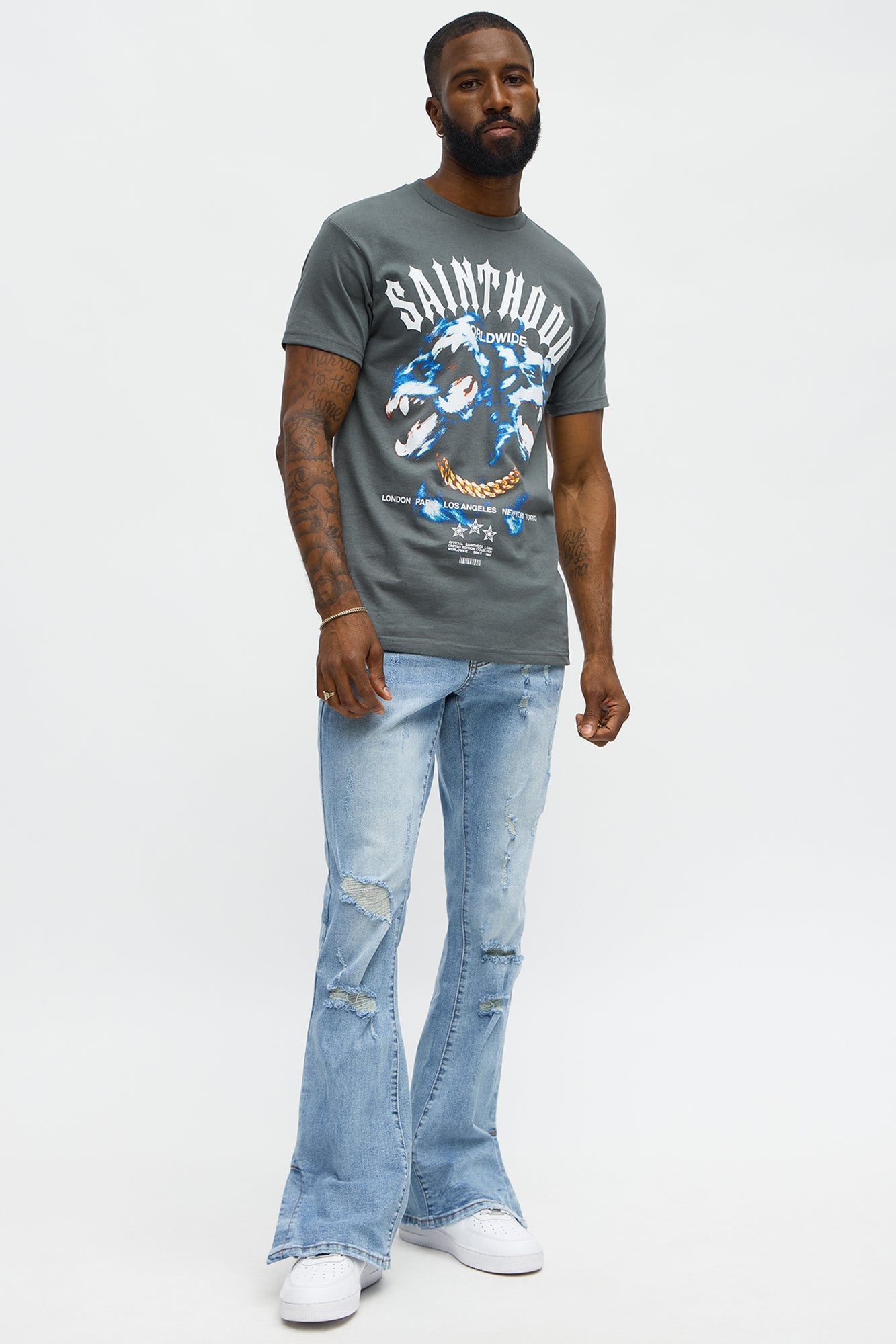 Stacked Skinny Flare Slit Rebel Against Distressed Jean - Light Wash Fashion Nova