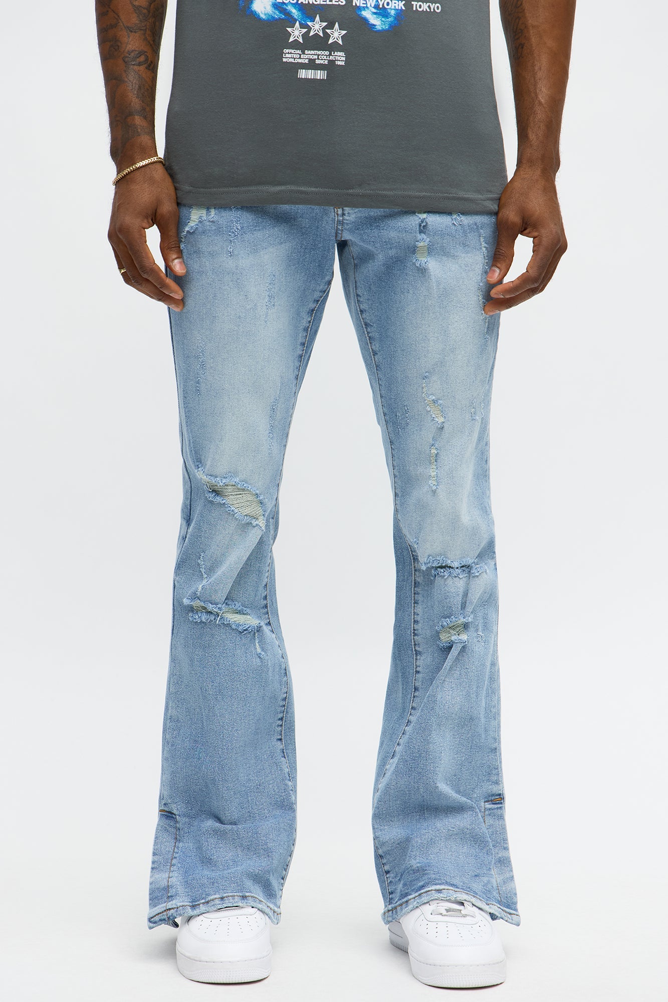 Stacked Skinny Flare Slit Rebel Against Distressed Jean - Light Wash Fashion Nova