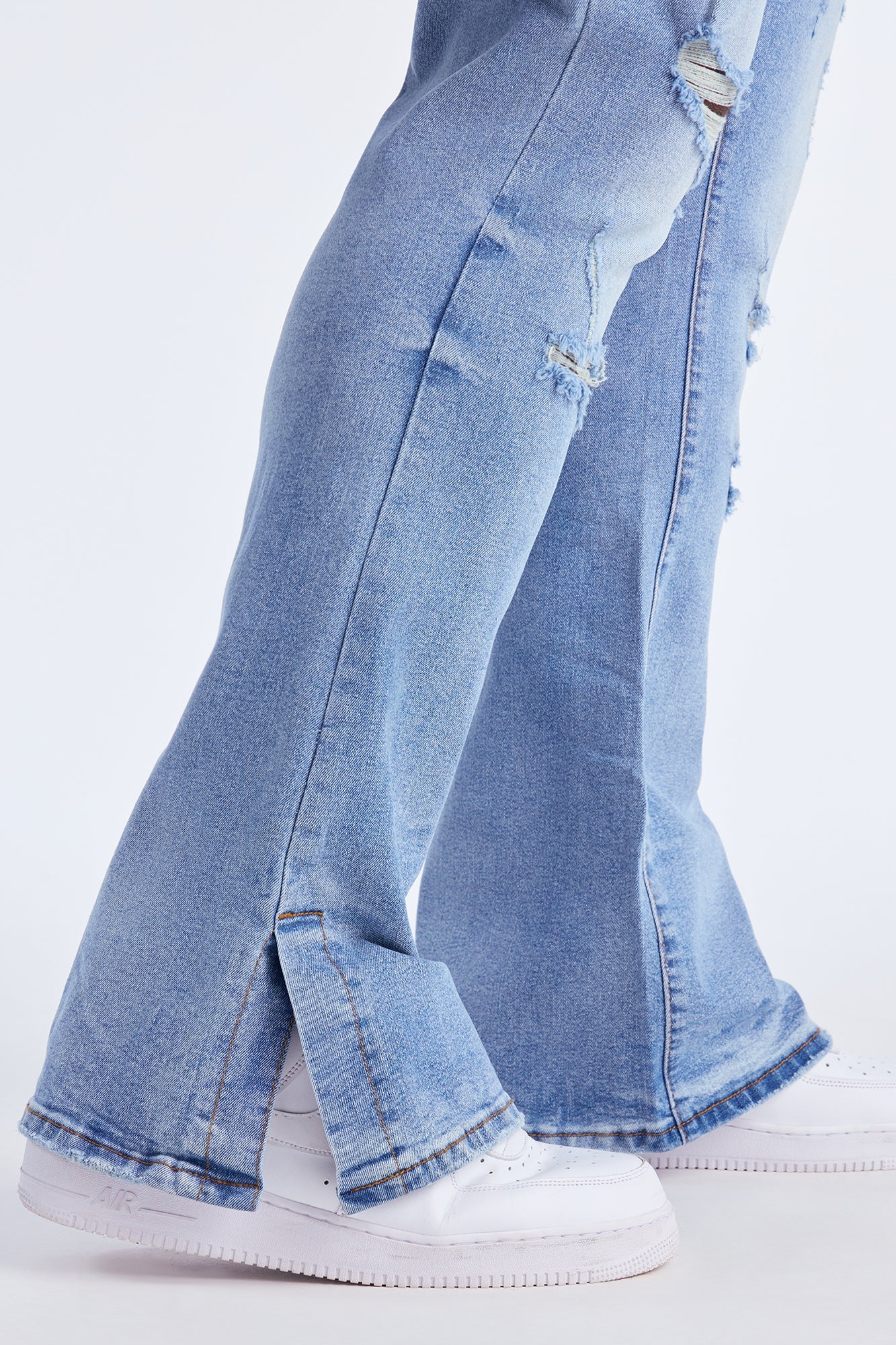 Stacked Skinny Flare Slit Rebel Against Distressed Jean - Light Wash Fashion Nova