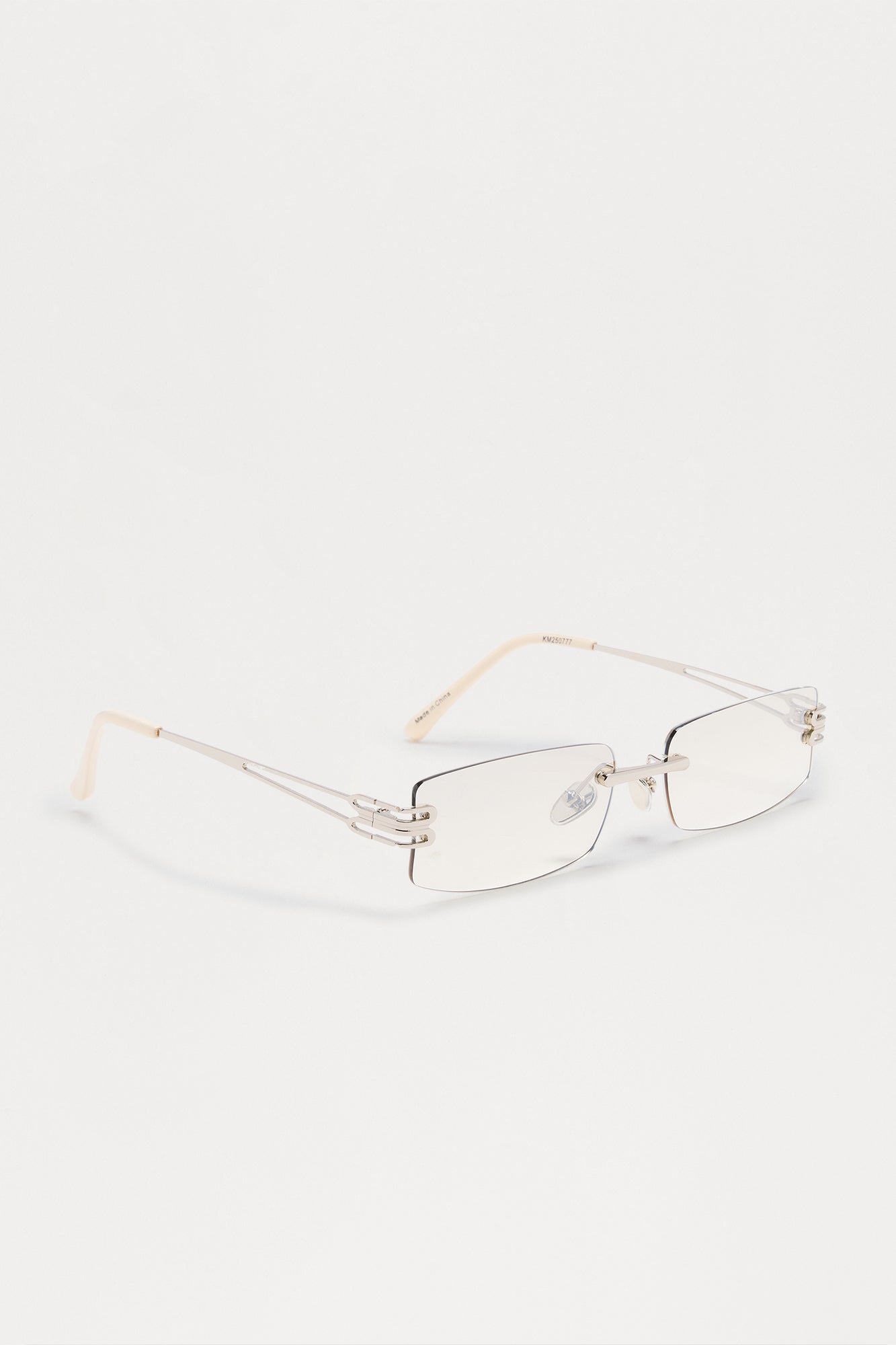 Sleek Frameless Metal Sunglasses - White Fashion Nova