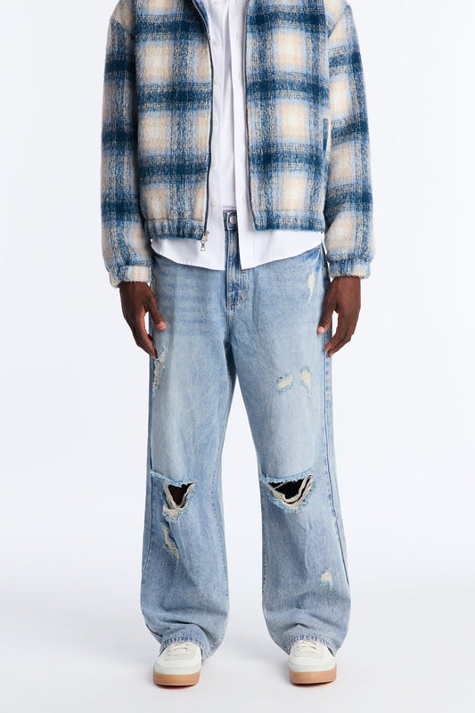 Baggy On The Grind Destroyed Jean - Light Blue Wash Fashion Nova