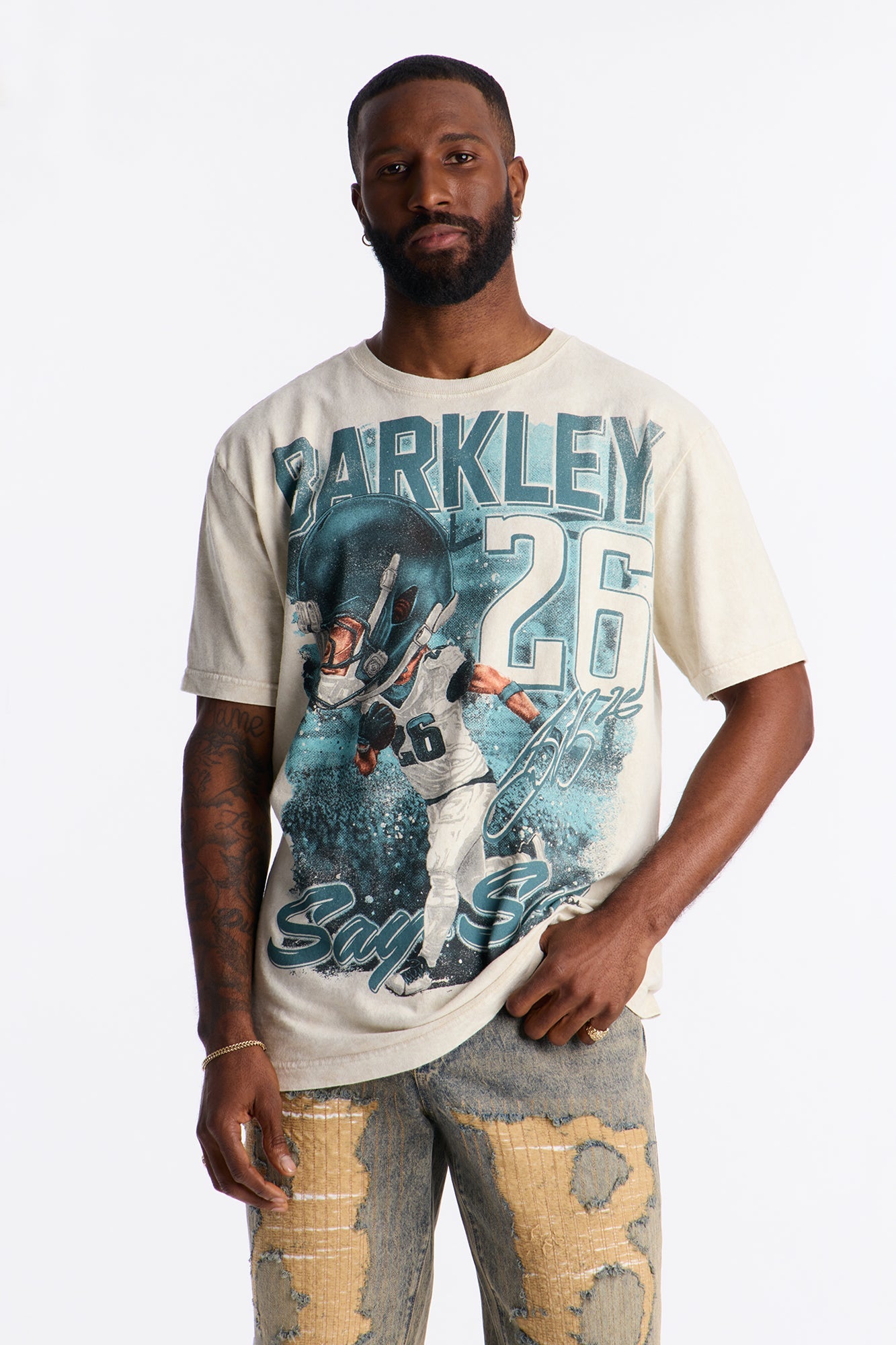 Saquan Barkley Bobble Head Short Sleeve Tee - Sand Fashion Nova