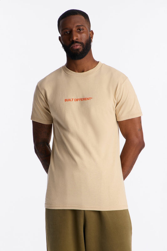 Built Against All Odds Short Sleeve Tee - Tan Fashion Nova