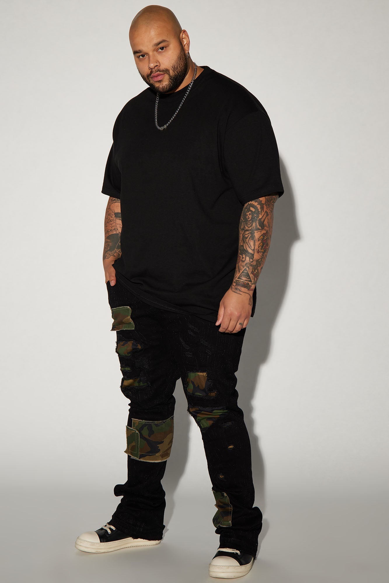 Hint Of Camo Stacked Skinny Flare Jeans - Black Fashion Nova