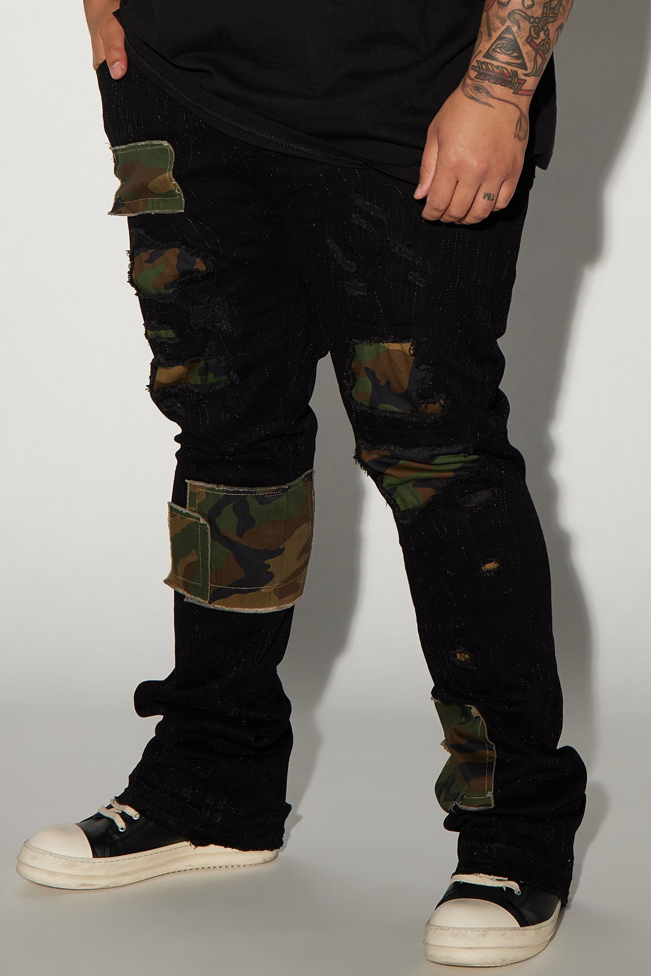 Hint Of Camo Stacked Skinny Flare Jeans - Black Fashion Nova