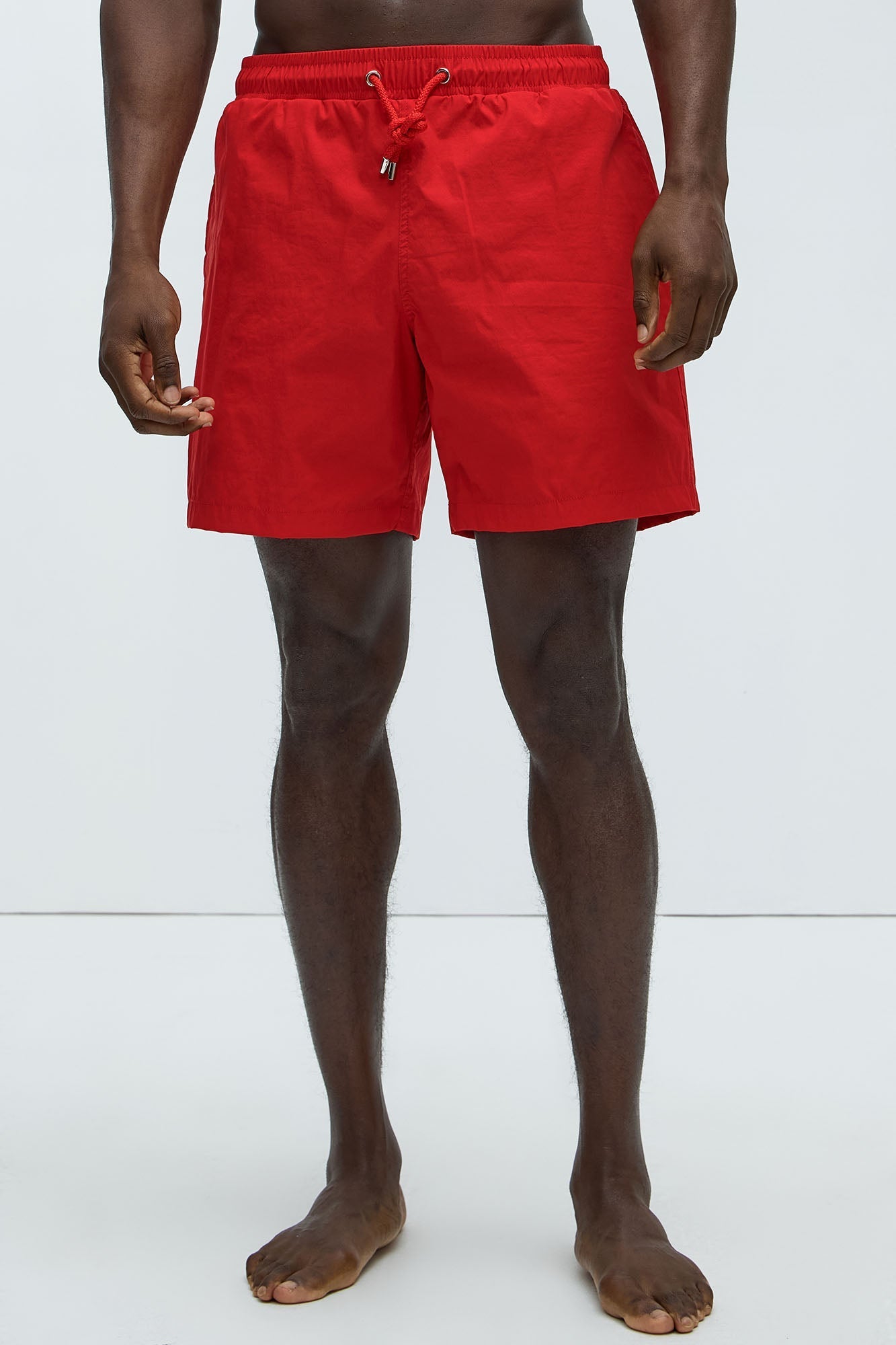 Montez Stretch Swim Trunk 7″ - Brick Red Fashion Nova