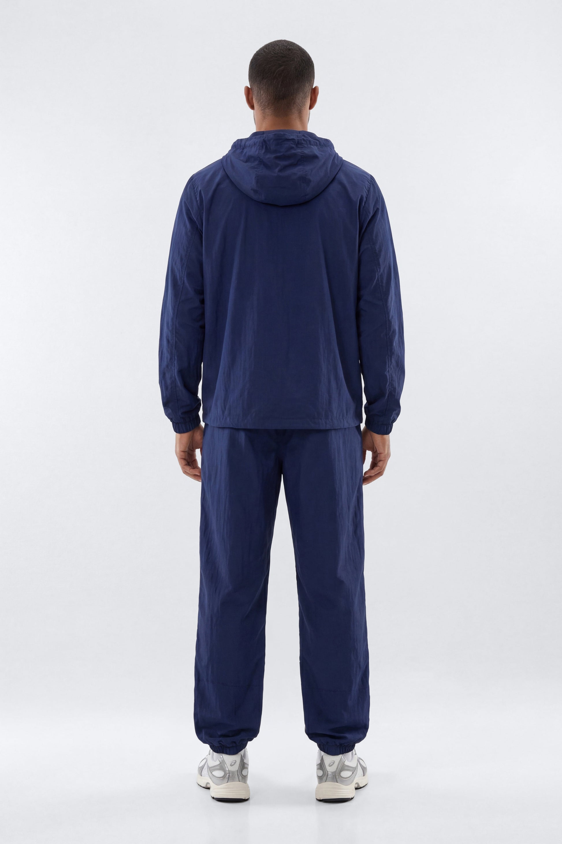 CoreNylon 32″ Track Pant - Navy Fashion Nova