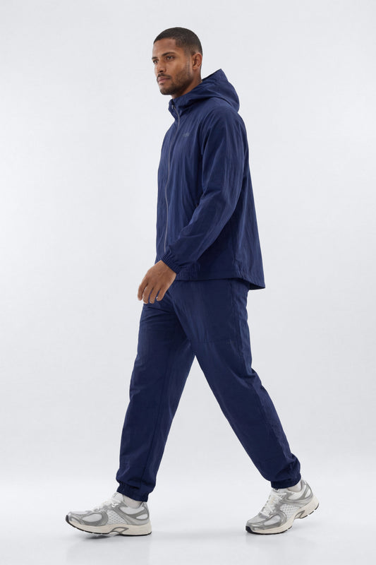 CoreNylon 32″ Track Pant - Navy Fashion Nova